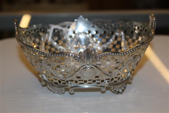 Goldsmiths & Silversmiths (Gibson & Langman) pierced silver basket, with swag & foliate embossing, London 1895